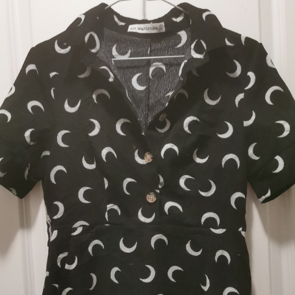 Stylish Black and White Mini Dress Cresent Moon, it has pockets. - Picture 6 of 7